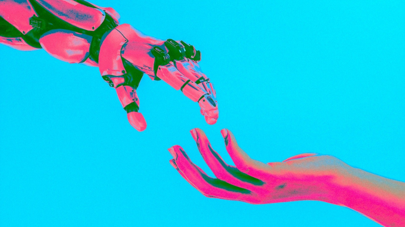 Robot hand reaching toward a human hand